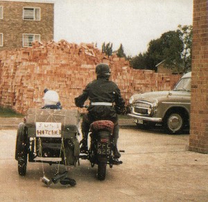 Just hitched – and with boots and cans in tow, the honeymoon couple watch out for the Hillman Minx and set off in their outfit for a Scottish adventure