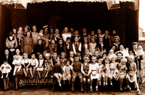 ‘Our gang’ on the concert street-party stage erected on a bomb site in Leyton, London in 1945.