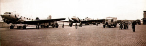 As Dakota aircraft are emptied, a German lorry is loaded and on its way to Berlin