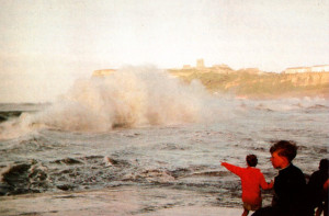 A wall of water lashes the promenade below Scarborough Castle in 1960