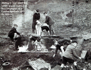 Making a 'den' amid the rubble of war, a group of boys congregate on a London bomb-site after the blitz. Photo: Hulton Getty Picture Collection