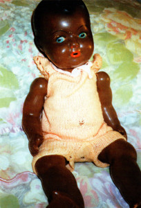 Margaret the black china doll, which spent many a night 'sleeping'in the Anderson shelter at the writer’s home.