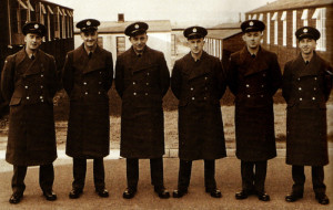 Mike (second from left) and fellow National Servicemen pictured just after being kitted out with uniforms - hence the creases!