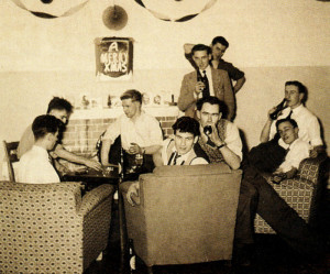 Frank (far back) and friends enjoy their 'Christmas' room