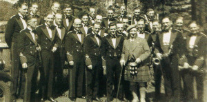 Sir Harry Lauder and the RAMC Band in their concert uniforms at the Garrison Theatre, Aldershot, in 1940.