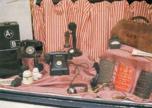 Press Button B to get your money back. Like many other things in life, telephones have changed since the Thirties. This lovely display was seen in a Kirkwall shop window in the Orkneys.