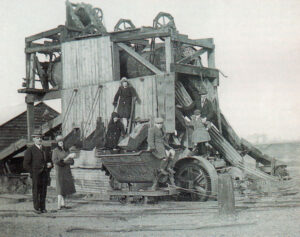 Early days of gravel extraction at the author’s father’s Wivenhoe quarry in Essex. In this 1929 picture showing the sand and gravel screening plant, William Loveless stands front, far right, and is flanked by Leslie Compton, former centre-half for Arsenal and England as well as wicket-keeper for Middlesex and his more famous brother Denis Compton, one of the greatest-ever England cricketers and also an ex-Arsenal footballer. Denis is now 19 while Leslie has passed away. The Comptons were first cousins of William whose father is on the far left.