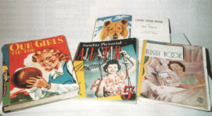 Some of the books Irene Purslow received as Christmas presents after the war, including Our Girls' Tip Top and Lassie Come Home