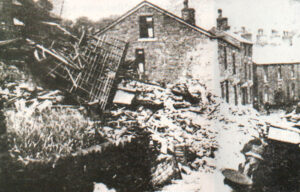 Two cottages demolished when a bomb fell on Hayfield during the 1942 raid.