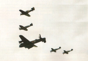 A rare sight indeed - the Battle of Britain Memorial Flight with two Messerschmitt Bf 109s at the 1995 Fighter Meet at North Weald.