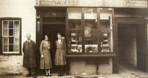 Remember that wonderful fresh, clean smell when you walked into an old time dairy shop? The staff line up proudly outside the West Street Dairy