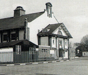 The Camp Cinema at Uxbridge in the days when locals could walk unchasllenged through the main gates of RAF Uxbridge and up to the paybox. The guard room is on the left - but there isn't an armed guard in sight!