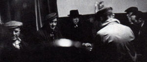 Dominoes in the tap room of the Crown Inn. From left are Jim Lomas, Tom Fletcher, Bill Berrisford and Herbert Jennings.