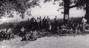 Happy days! The beer crates come out while en route to Southend on a firm’s outing around 1948.