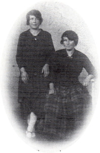 The writer’s paternal grandmother (seated) and a cousin.