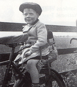 Off on another nature hunt! David on the back of his father’s bicycle.