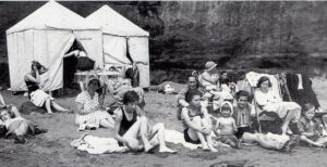 Campers on the beach outside Shanklin around 1934. The author’s mother and much younger brother are on the right.