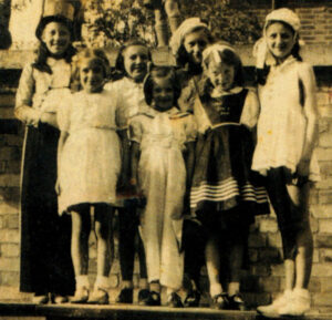 Rosemary (right) continued to perform for friends and neighbours - her wartime finale was at this VE-Day street