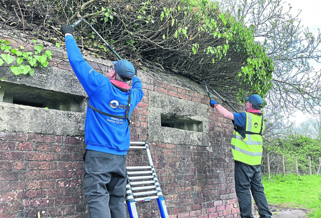 Volunteers at Garston Lock pill box. ALL PHOTOS: CRT